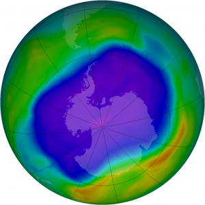 Satellites observed the largest ozone hole over Antarctica in 2006. Purple and blue represent areas of low ozone concentrations in the atmosphere; yellow and red are areas of higher concentrations. New research shows Earth's atmosphere contains an unexpectedly large amount of carbon tetrachloride, an ozone-depleting compound, from an unknown source decades after the compound was banned worldwide. Credit: NASA 